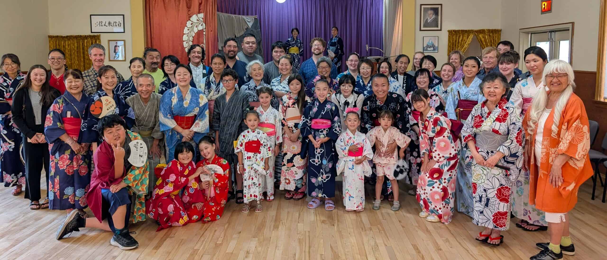 Group of people dressed in traditional Japanese yukatas gathered at Kamloops Japanese Canadian Cultural Centre.